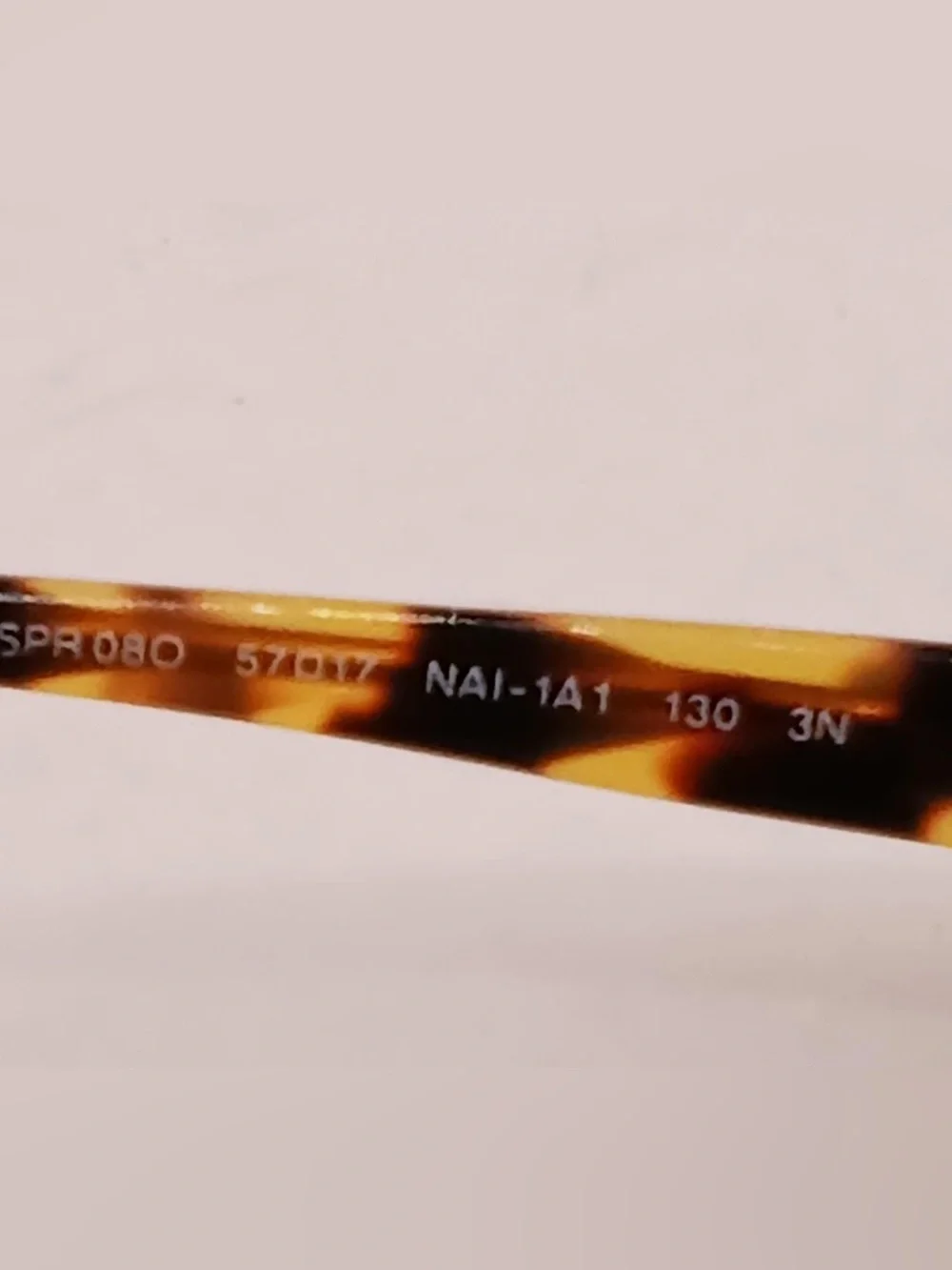 Prada Tortoiseshell Frame Sunglasses with Dark Gray Lenses
